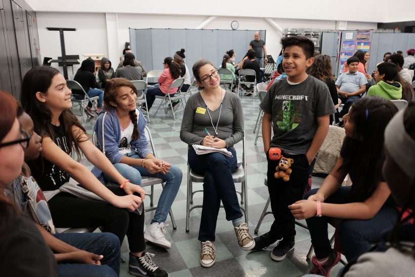 JB Arts Students and UCLA Mentors during a workshop activity.