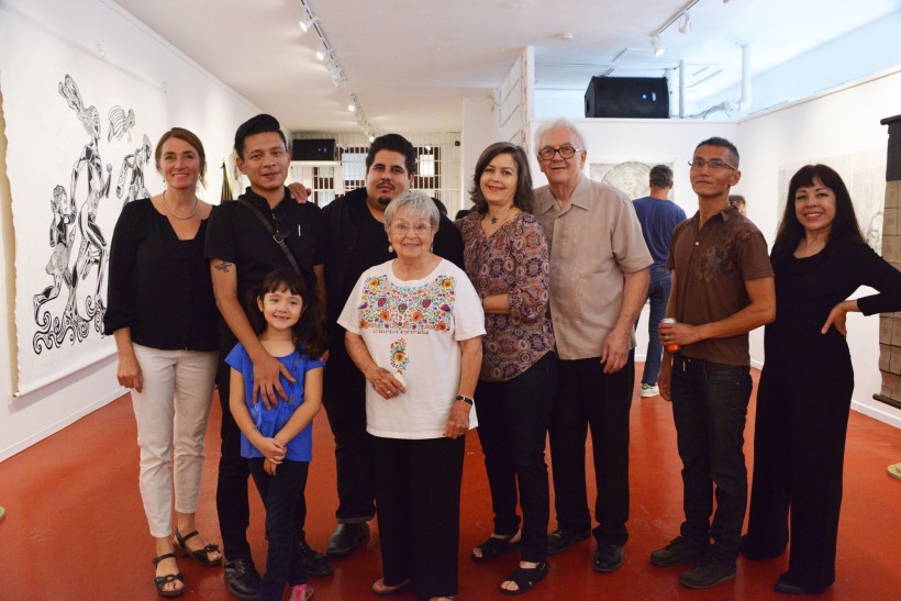 Artists from the exhibit. L to R: Marianna Sadowski, Pavel Acevedo and daughter, Daniel González, Kay Brown, Poli Marichal, Dan Newton, Nguyen Ly, and Yvette Mangual. Not Pictured: Sergio Sánchez Santamaría and Joel Rendón.
