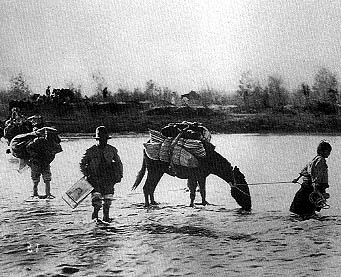 Mexicans crossing El Rio Grande into the United States