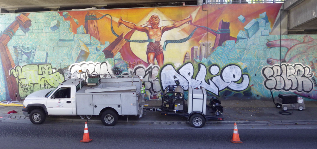 SPARC’s very own invention – MuralShield: Demo on Baca’s -1984 Olympic Mural “Hitting The Wall”